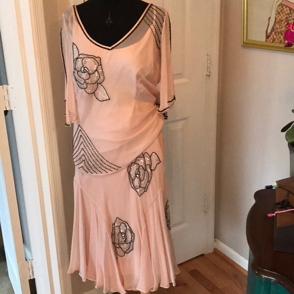 Silk, beaded top w/matching skirt.